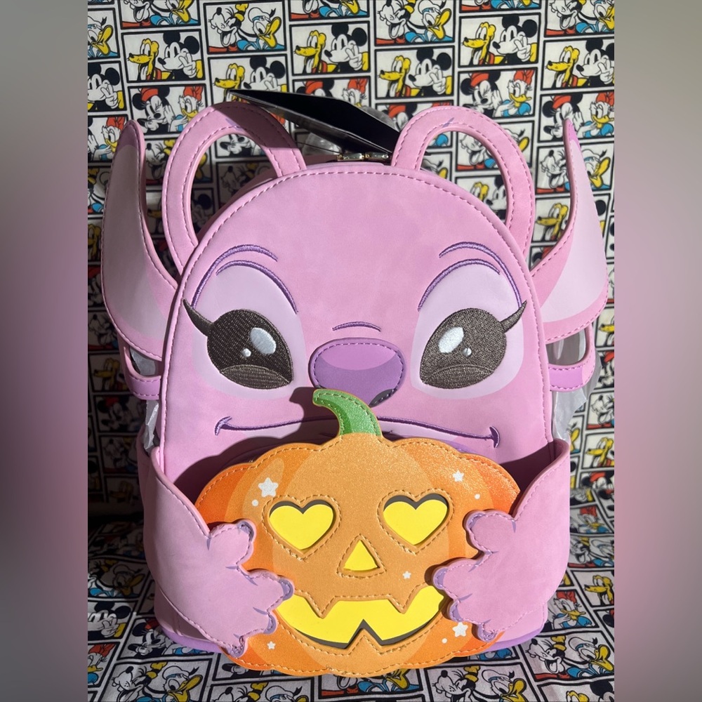 LOUNGEFLY DISNEY ANGEL HOLDING PUMPKIN GITD MINI BACKPACK NWT 2025